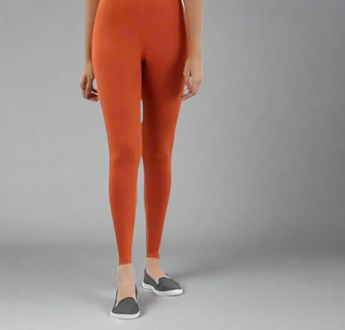 Enhance your wardrobe with our stylish and comfortable Polyester Solid Leggings for women. Made with modern influences, these leggings offer a cool and chic look, while providing maximum comfort. Perfect for any occasion, these leggings are a must-have for the fashion-forward woman.